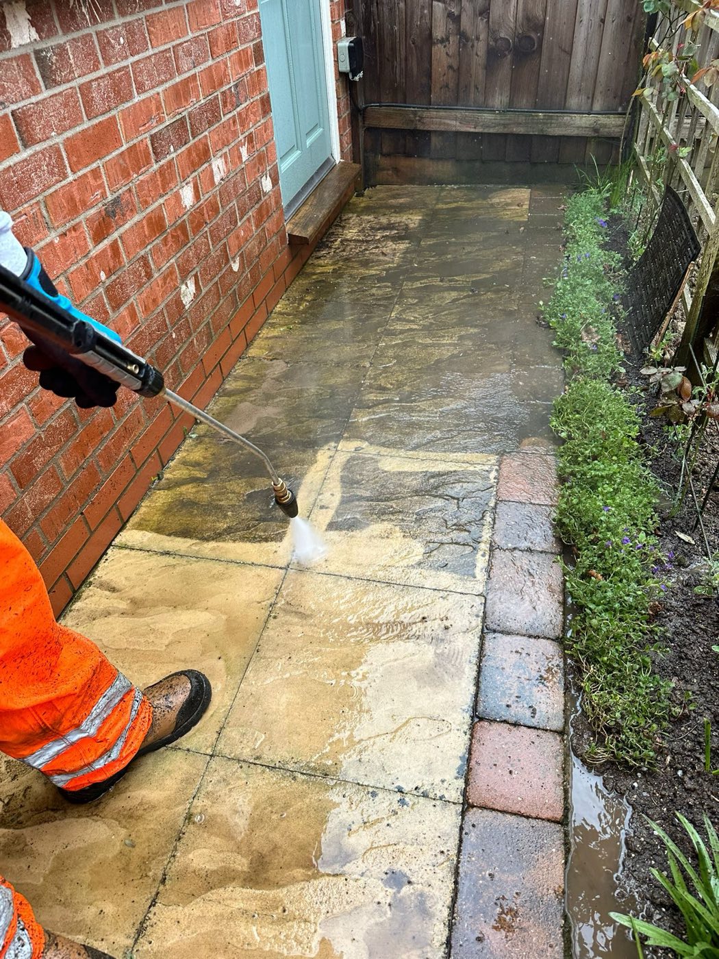 A path half-cleaned, showing the dramatic before and after