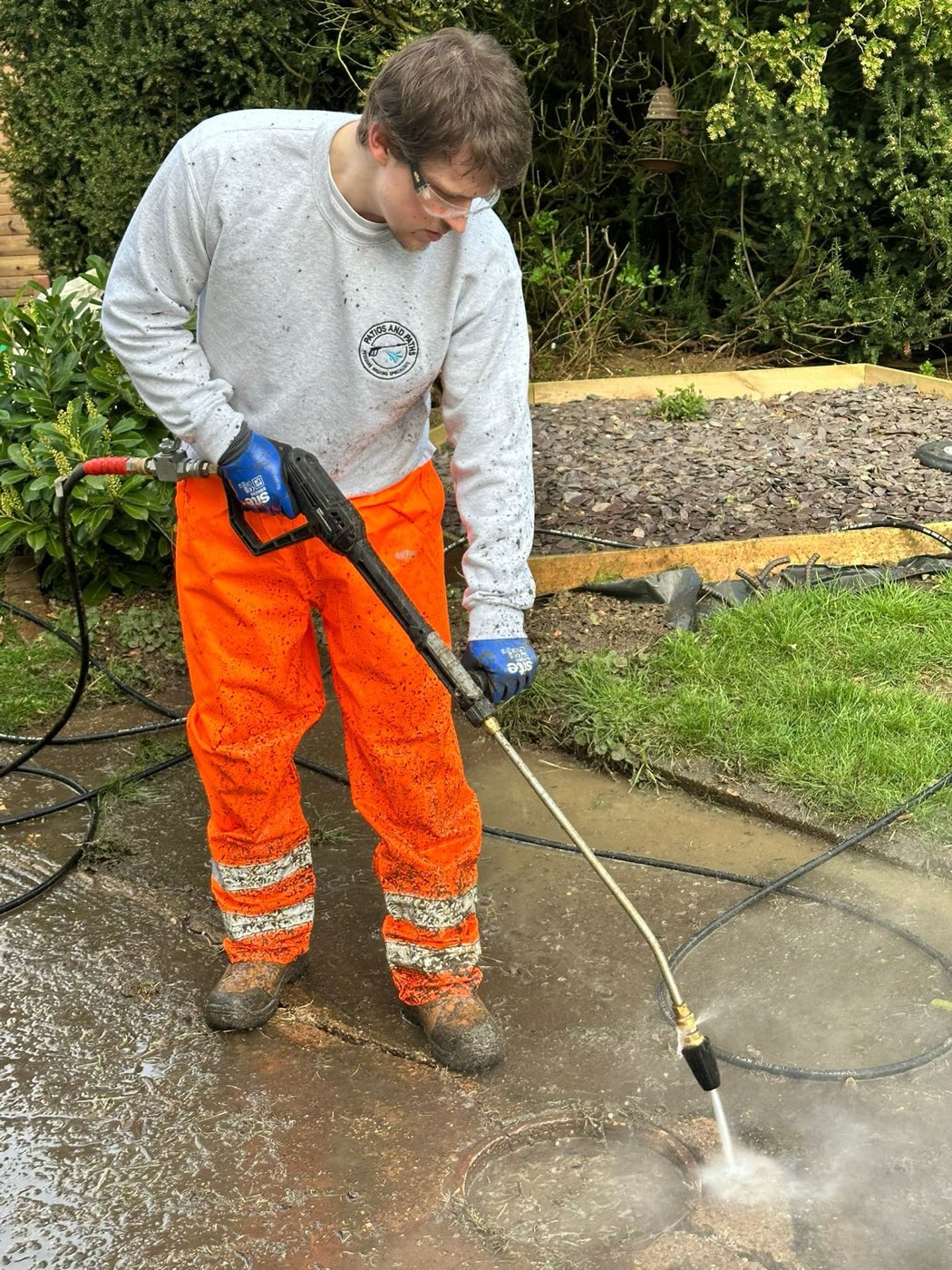Pressure washing a patio